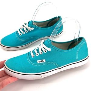 teal colored vans